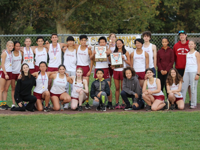 The cross country team, this year's division champs. Luca Sheldon